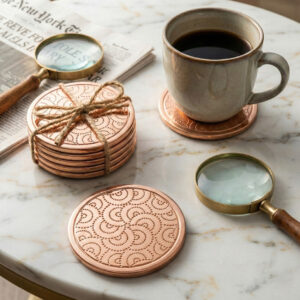 rose gold coasters for coffee table, metal tea coasters set of 6, premium luxury table accessories, geometric patterned drink coasters, copper finish home decor, durable office desk coaster, handcrafted indian metal handicrafts, housewarming gift ideas under 1000, festive dining table decoration, heat resistant metal pads.
